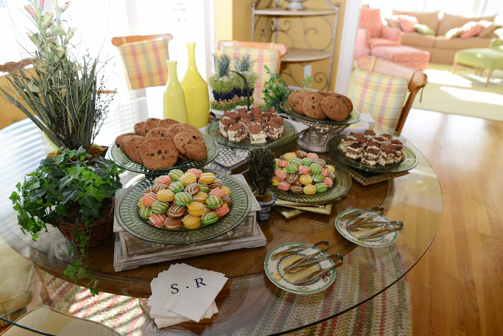 A table of catered refreshments including pastries, cookies and small plates (view 4)