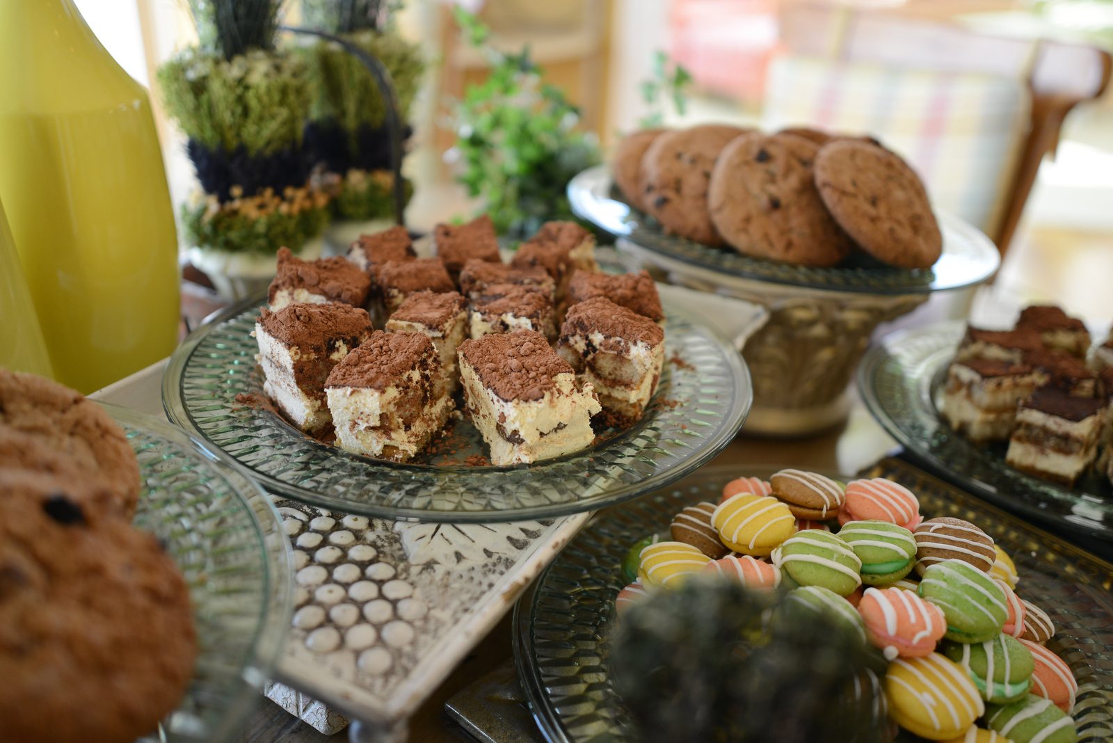 A table of catered refreshments including pastries, cookies and small plates (view 5)