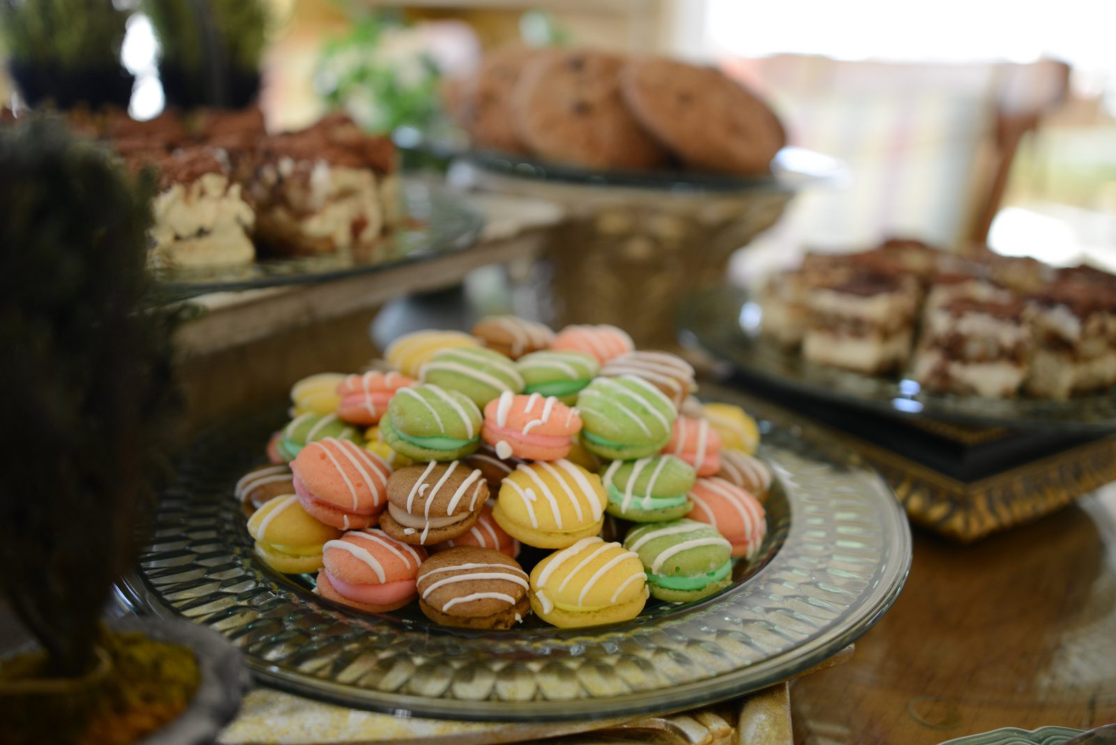A table of catered refreshments including pastries, cookies and small plates (view 6)