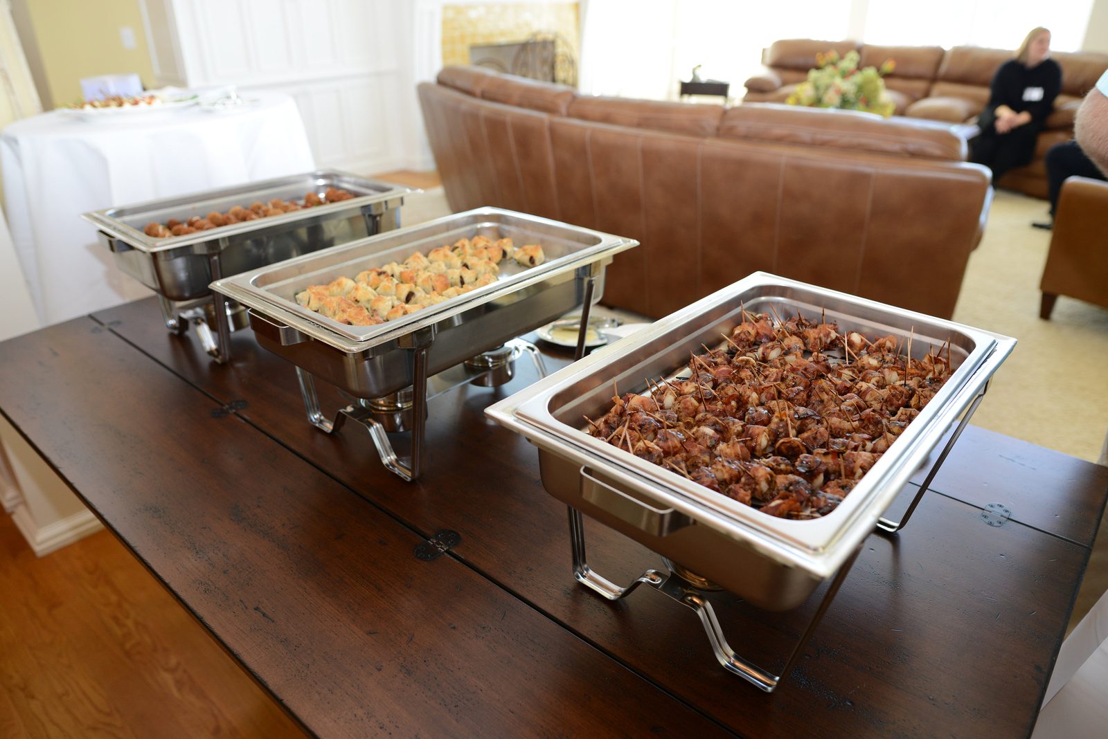 A table of catered refreshments including pastries, cookies and small plates (view 7)