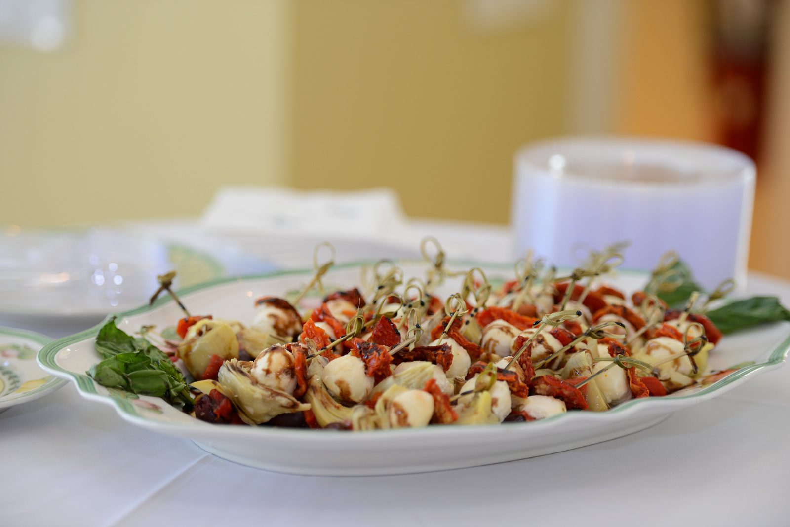 A table of catered refreshments including pastries, cookies and small plates (view 9)
