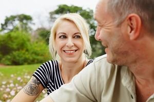 Caucasian couple looking at each other and smiling