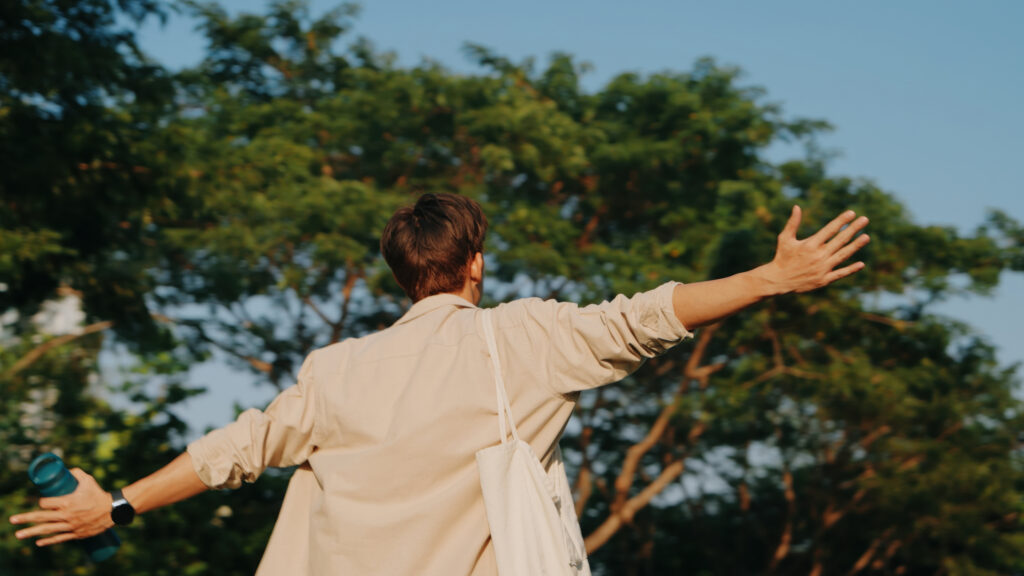 Young Man Embracing Mindfulness in Nature, Mental Health Awareness, Tranquility and Peacefulness