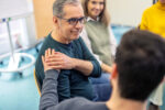 Man getting emotional support during treatment for substance use