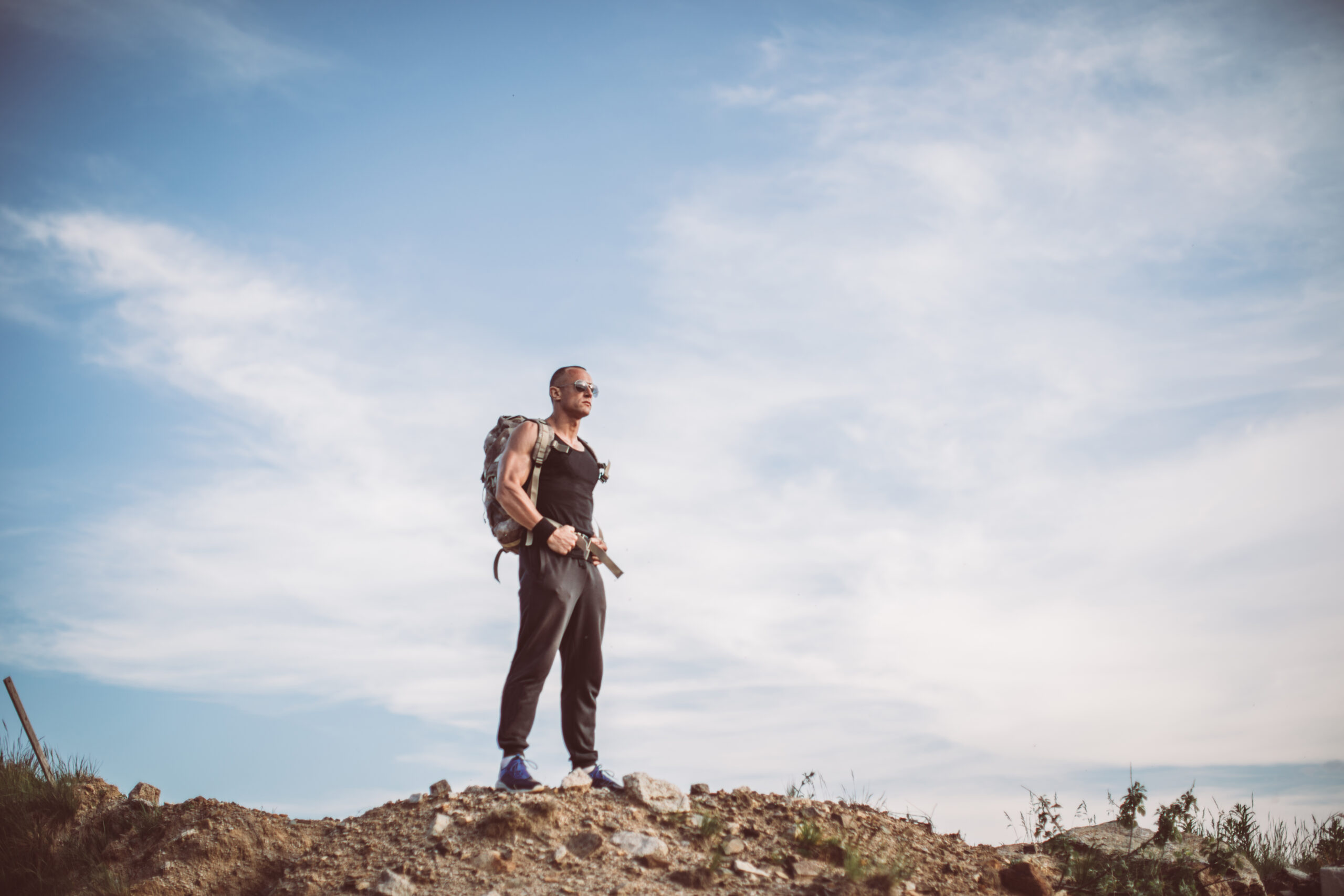 Young athlete walking on the mountain path